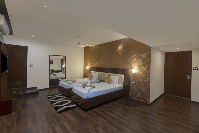 Guest room at Hotel Hemaadri Grand